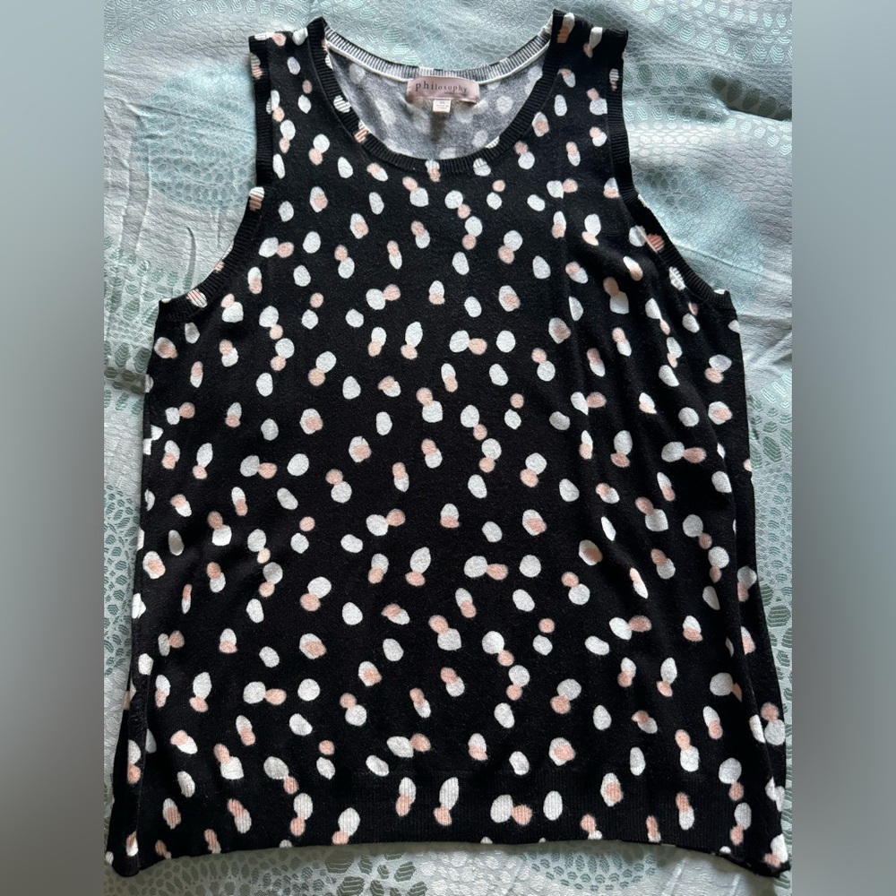 Cute knit sleeveless top. Pink & white polka dots print